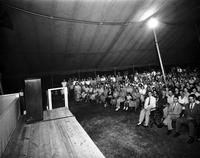 Audience in revival tent
