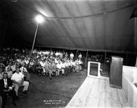 Audience in revival tent