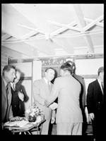 Men Shaking Hands at a Political Meeting