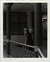 Clarence John Laughlin photographing in the Arcade Building,Cleveland, Ohio