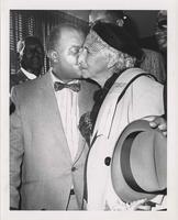Louis Armstrong kissing Mrs. Jones