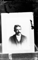 Photograph of a portrait of an unidentified man