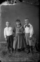 Portrait of three unidentified young children
