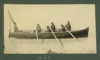 United States Navy crewmen in longboat off Baton Rouge.