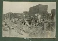 Burton Lumber Company, sandbagging against the flood.