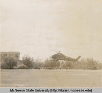 Army helicopter on campus