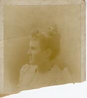 Unidentified woman with adornment in her hair