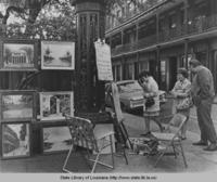 Artist selling artwork in Jackson Square New Orleans Louisiana