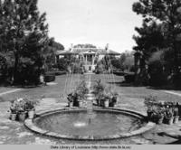 Fountain and house at Longue Vue Gardens in New Orleans Louisiana in the 1970s