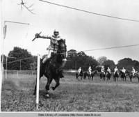 Horseback riders competing in Tournoi at the Cochon de Lait festival in Mansura Louisiana circa 1971
