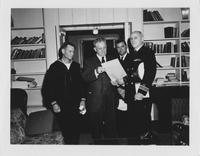 Governor Earl K. Long Posing for Picture with Navy Men on March 2, 1960.