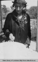 Mrs. J.C. LeBleu cutting her 97th birthday cake in  Calcasieu Parish Louisiana in 1937