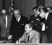 Governor John McKeithen signs the Proclamation of International Acadian Festival in Baton Rouge Louisiana in 1968