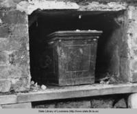 Coffin in decayed vault at Girod Cemetery in New Orleans Louisiana in the 1940s