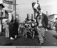 Crowds during Mardi Gras on Canal Street in New Orleans Louisiana in 1970
