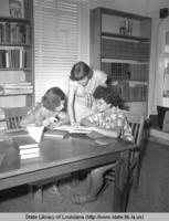 Librarian with children at the Evangeline Parish library in Ville Platte Louisiana in 1949