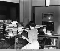 Kathryn Wright in the circulation department at Hill Memorial Library in Baton Rouge Louisiana in circa 1940s