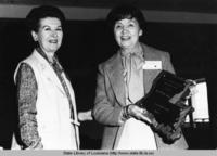 Harriet Callahan presents an award to Evangeline Lynch at the Louisiana Library Association conference in 1982