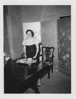 Mrs. Earl K. Long Serving a Dish at a Reception, Governor's Mansion on August 29, 1957.