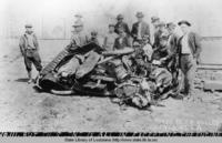 Men and boys with smashed up car in Lenzburg Louisiana around 1916