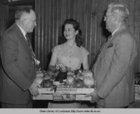 Box of citrus fruit being awarded at the Orange Festival in Buras Louisiana in 1947