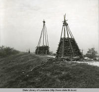 Bonfire structures on the levee at Reserve Louisiana in 1970