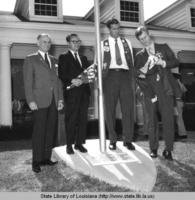 Flagpole dedication ceremonies at the tourist reception center in Vinton Louisiana