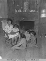 Leola Desadier reading books delivered by the public library in Natchitoches Parish Louisiana in the 1947