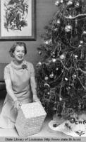 State Librarian Sallie Farrell with Christmas tree at the State Library in Baton Rouge Louisiana in 1968