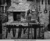 Blacksmith exhibit from colonial times in the Cabildo in Jackson Square in New Orleans in the 1940s