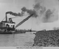 Dredging machine filling the levee at Bayou de Glaise at Simmesport Louisiana