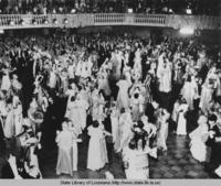 Dancing in a ballroom during Mardi Gras in New Orleans in the 1930s