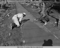 WPA workmen constructing concrete sidewalks in Ferriday Louisiana in the 1930s