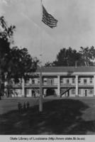 Raising of the flag at the Pentagon Barracks in Baton Rouge Louisiana circa 1940