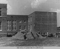 Workmen building the Delhi High School addition in Delhi Louisiana in 1936