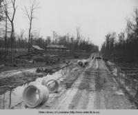 Homes being built on the new farm-to-market road near Oak Grove Louisiana in 1937