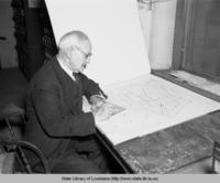 F.D. Bull, an architect, draftsman and civil engineer re-indexes records at the Court House in Lake Providence Louisiana in 1937