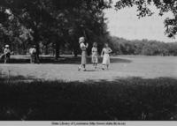 Women playing golf on the Audubon Park golf course in New Orleans in the 1930s
