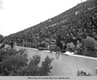 View of stadium at field level at the Louisiana State University versus Tulane football game opening the new end zone built by the WPA in Baton Rouge in 1938