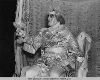 King of Comus drinking a toast to his queen in New Orleans in 1939