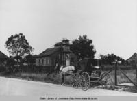 U.S. mail horse and buggy in front of church in Taft Louisiana circa 1940