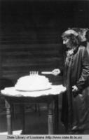 Mrs. J.C. LeBleu cutting her cake on her 97th birthday in Louisiana in 1937