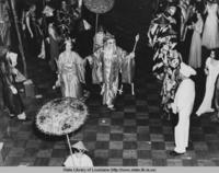 Royalty at a New Orleans Mardi Gras ball in the 1930s
