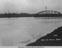 Texas and Pacific Bridge submerged in flood waters in Melville Louisiana in 1927