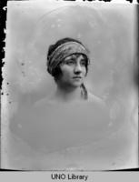 Young Woman Wearing Head Scarf]