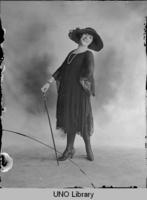 Young Woman with Walking Stick]