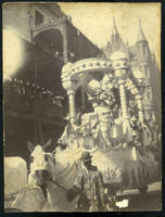 Rex parade float moving uptown, ca. 1910.