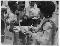 Ruby Bridges signing autographs for students at F.C. Williams on Ruby Bridges Day.