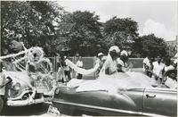 Girls on convertible float in the Jolly Bunch Parade