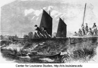 Cajuns pulling a boat along the Bayou Lafourche levee.